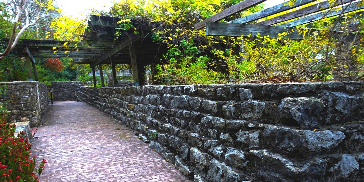 ZSC-Increase-Home-Value-with-Stone-Walls- outdoor stone walkway through garden