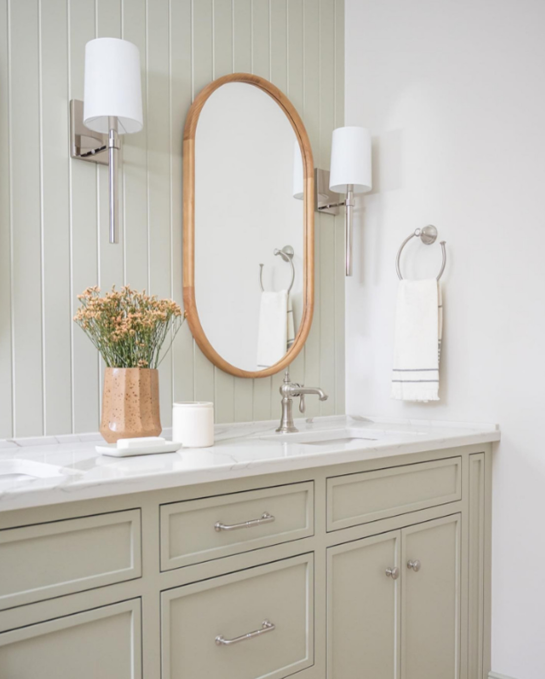 stone vanity countertop in bright, clean bathroom